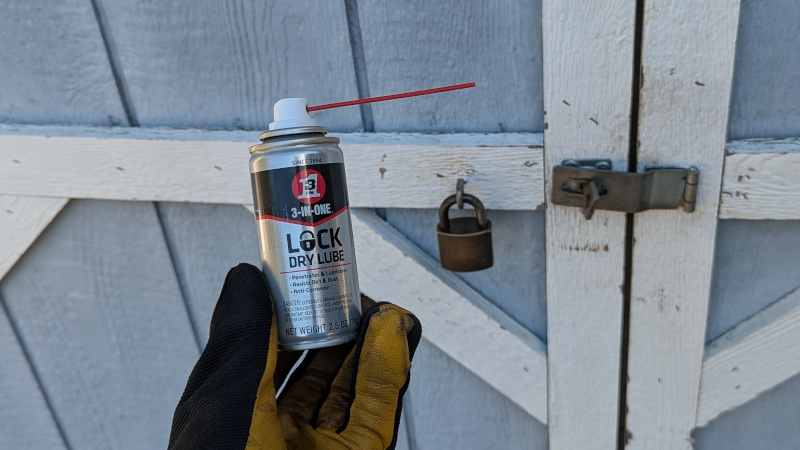 Power tool shed with lock dry lube